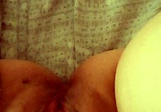 Watch her open her mature pussy at dawn, ready for action!