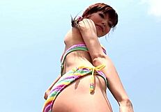 Skinny Japanese Chick Enjoys Photoshoot On The Beach