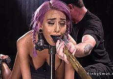 Purple haired petite sub endures device bondage