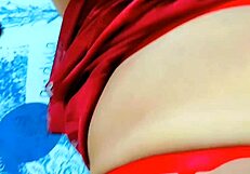 Hey, watch this muscular cheerleader in skirt tease with toys on desk