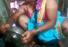 Indian Sexy Aunty Teases While Cleaning Plate in Dorm