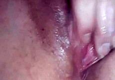 Horny amateur massages her wet pussy, ready for a good fucking in this homemade scene.