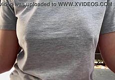 Italian MILF smokes outdoors, big tits exposed!