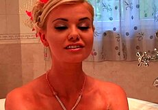 blonde milf masturbates shaved pussy in jacuzzi!