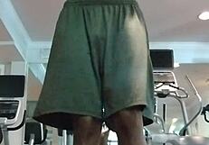 Sexy Mature Woman Performs Pole Dance in Gym Dorm