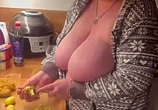 Wow, those two huge German MILF boobs working in the kitchen!