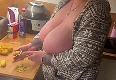 Wow, those two huge German MILF boobs working in the kitchen!