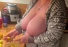 Wow, those two huge German MILF boobs working in the kitchen!