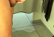 branlette dans une cabine dessayage with big cock flashing.