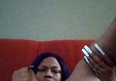 Ebony Woman Making Herself Creamy In Hairy Black Setting