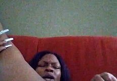 Ebony Woman Making Herself Creamy In Hairy Black Setting