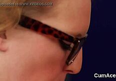 Hot looker receives facial cumshot while sucking