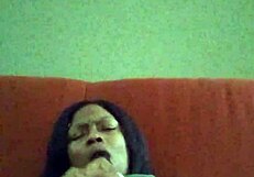 Ebony Woman Making Herself Creamy In Hairy Black Setting