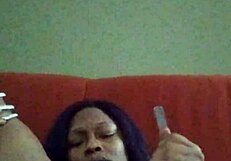 Ebony Woman Making Herself Creamy In Hairy Black Setting