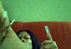 Ebony Woman Making Herself Creamy In Hairy Black Setting