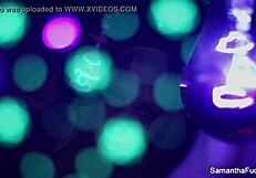 Samantha Saint enjoys lesbian oral with big tits under black light
