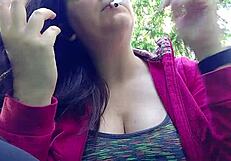 Nicoletta Smokes In A Public Garden And Teasingly Shows Her Big Tits