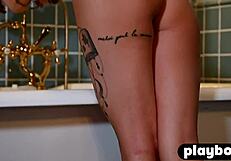 The inked blonde teen strips naked, posing seductively for Playboy