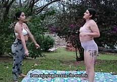 Latina lesbians practicing yoga together