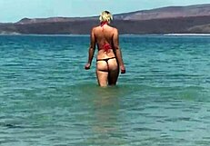 Boyfriend's big cock gets deepthroat in bikini, cumshot on tits at beach.