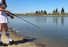 young petite girl in uniform moans while fishing outdoors after school