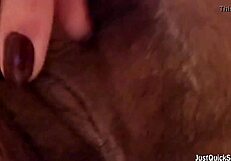 Busty amateur intensely rubs her wet hairy pussy