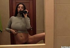 Busty amateur intensely rubs her wet hairy pussy