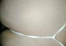 Latina big ass bent over in thong