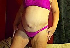 Preggo milf strips in thong, teases big tits, wants fucking