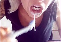 Chantal demonstrates proper tooth brushing and filling mouth with toothpaste in close up