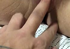 Wife Fingering Her Pussy While Using Vibrator For Intense Masturbation Session.