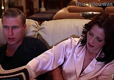 MILF Gives Handjob Under The Covers