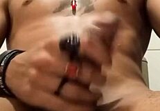 Is this Brazilian guy jerking off solo in close-up for you to watch?