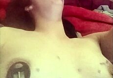 Raven Grey pours wax on tits and pussy.