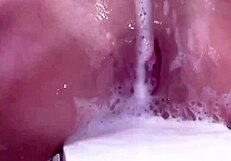Enjoy the oil and water mix in this bath scene with music