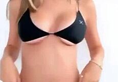 Boutinela shows off in all black bikinis, focusing on her ass.