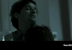 Does Juliette Binoche tease with her big tits in this topless scene?