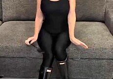 Wow, that ass in black bodysuit and hunter boots looks incredible!