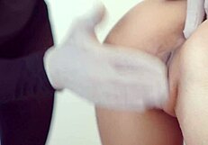 Detailed close-up of Asian amateurs in doggystyle, bent over with ass focus