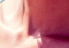 Mature Model Strolls Along the Beach in a Relaxed Manner