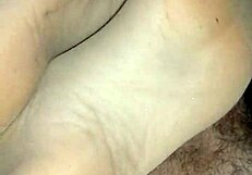 Homemade footjob with tan stockings, oops