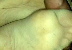 Homemade footjob with tan stockings, oops