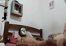 Milf sucking the sinister masked man intensely