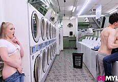 Stepmom and stepdaughter share a steamy moment in the laundromat