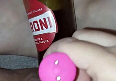 Hey, isn't Gretala the pregnant one rubbing a bottle on her juicy muscular pussy lips?