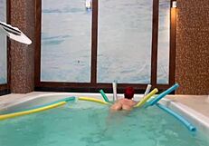 Hanging out in the pool with my friend for some casual fun and relaxation