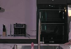 Hey, watch milf Sara Jay in kitchen with pink glass dildo on big tits and wet pussy 😏