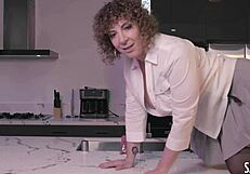 Hey, watch milf Sara Jay in kitchen with pink glass dildo on big tits and wet pussy 😏