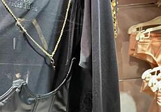 Is she masturbating in the changing room while trying new underwear?