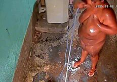 hidden camera catches stepmom showering and showing off big natural tits in the backyard